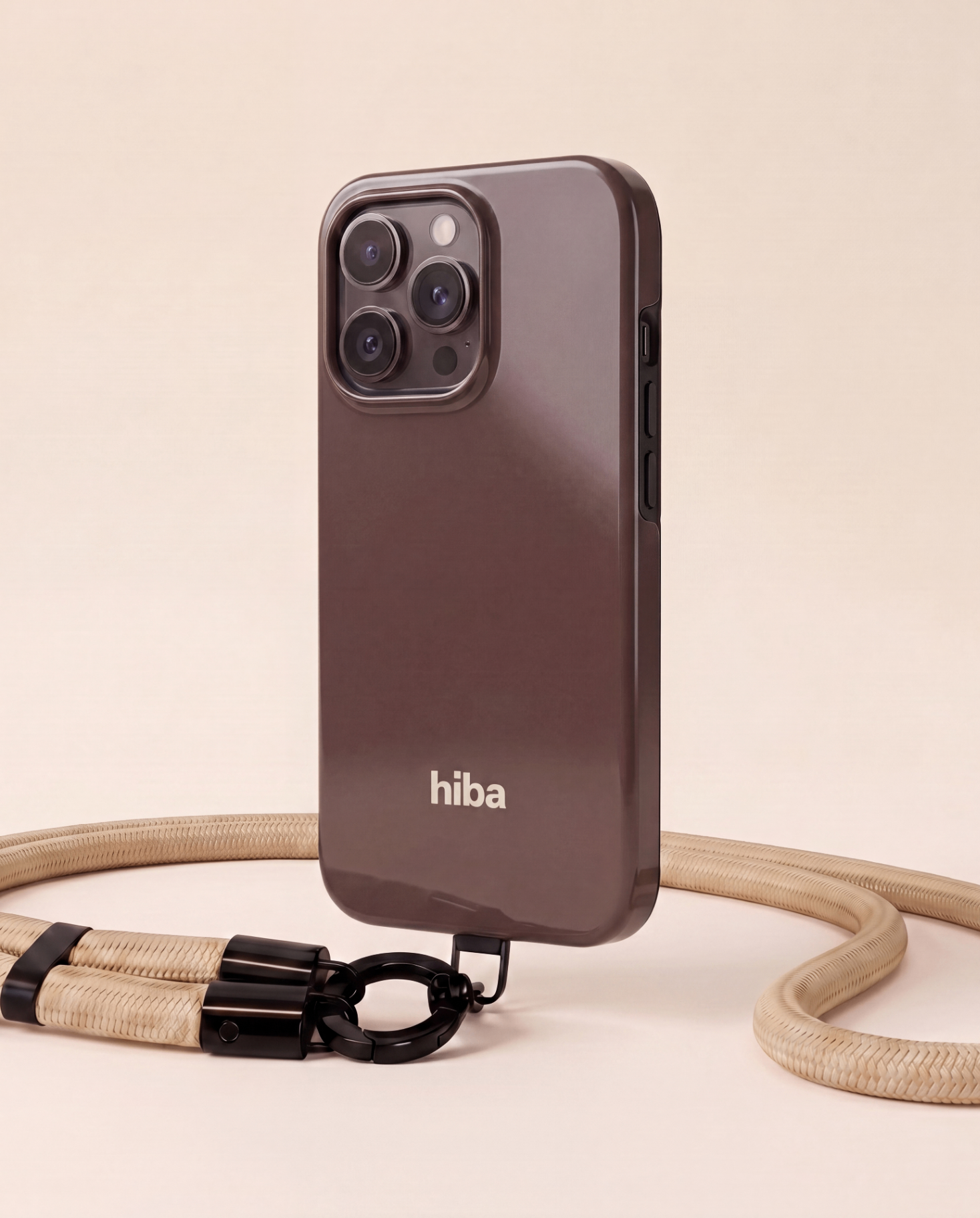 the phone strap worn crossbody in golden-hour light