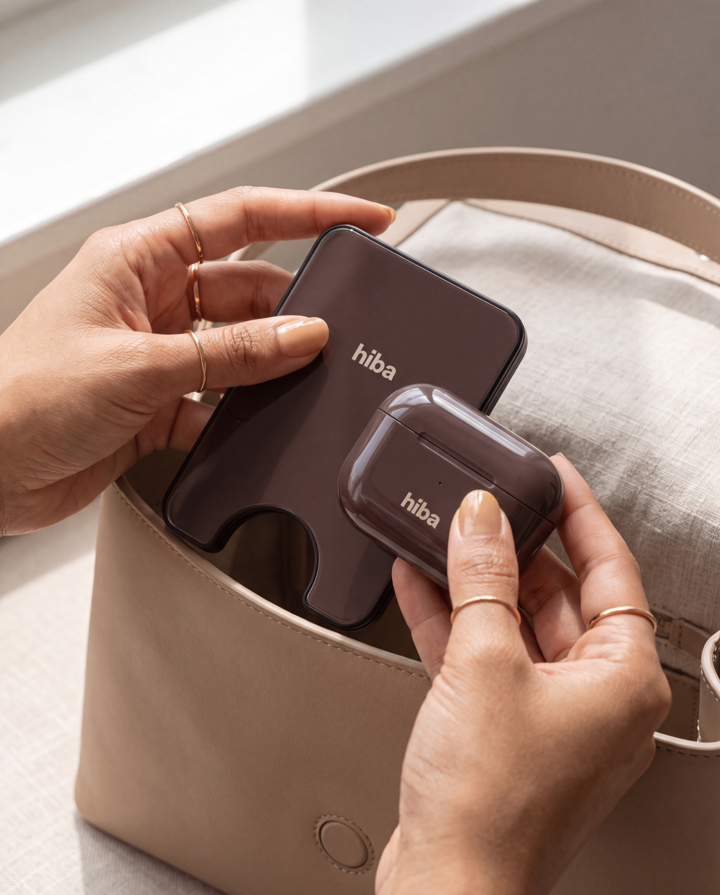 cardholder and wallet held in hand